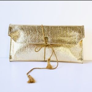 1950s St. Thomas gold lamé rolled storage bag